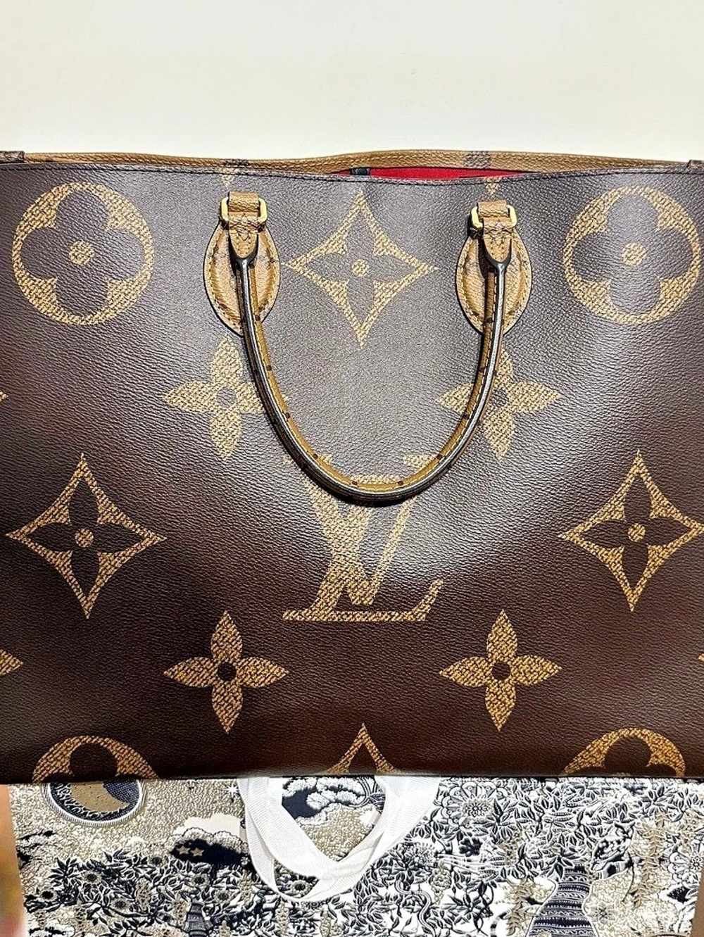 Louis Vuitton On the Go GM in Reverse Monogram Canvas. Comes with Entrupy Cert